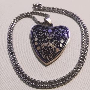 Black cat planchet necklace